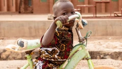 A boy on a bicycle at the Village-Opera school in Laongo, Burkina Faso - Wednesday 16 March 2022