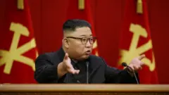 A photo released by North Korea's official KCNA news agency shows North Korean leader Kim Jong-un at a meeting of the Workers Party in Pyongyang. Photo: 18 June 2021
