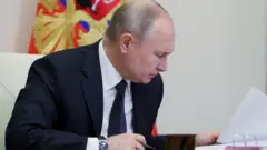 Путін