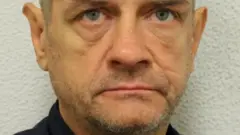 Adam Lewis urukiko ruvuga ko yashatse no kuruma umupolisi