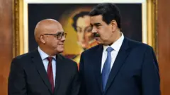Jorge Rodríguez y Nicolás Maduro