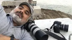 Abood Hamam on ruined bridge