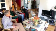 family watching tv