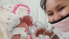 Baby River with her mother Reina Mae Nasino