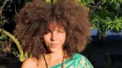 Julia Borges, 23 ans, étudiante en agriculture et en ingénierie à Recife, dit qu'elle ne veut pas avoir d'enfants pour l'avenir de la planète.