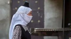 امرأة من الإيغور، منطقة شينجيانغ في الصين