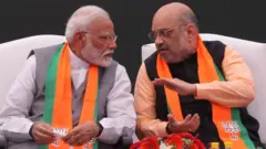 નરેન્દ્ર મોદી અને અમિત શાહ
