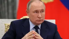 Путін