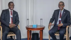 Perezida na Lazarus Chakwera wa Malawi na Paul Kagame w'u Rwanda i Davos mu Busuwisi mu 2022