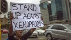 Protester with placard