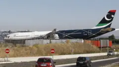 Gaddafi Airplane return