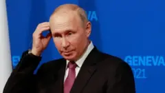 Путин