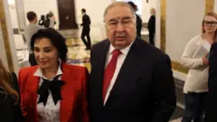 Алишер Усмонов ўз рафиқаси Ирина Винер билан