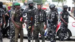 Nigeria police in group