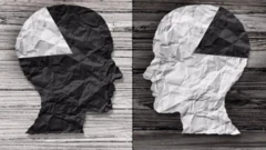 Arty picture of two heads facing each other with part of brain in different colour