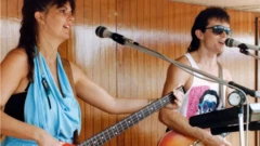 Tracy and Moss performing on board a cruise ship