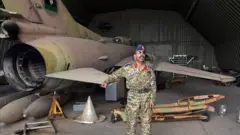 GNA officer Capt Qanunu posed next to a MiG-23 at captured al-Watiya airbase, 18 May 20