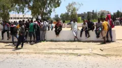 Des migrants et des réfugiés dans le centre de détention de Tajoura, en Libye