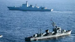 দক্ষিণ চীন সাগরে চীনা কোস্ট গার্ডের টহল।