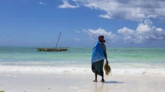 Wata mata a bakin teku tana diban ciyawa