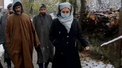 Ms Khursheed doing door-to-door campaigning.