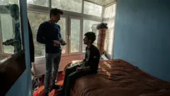 two students in flat