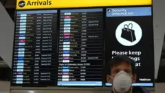 Man wearing mask at Heathrow