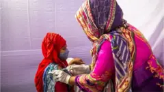নিবন্ধনের পর অনেকে টিকা পেয়েছেন, আবার অনেককে দীর্ঘদিন অপেক্ষা করতে হচ্ছে