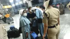नन