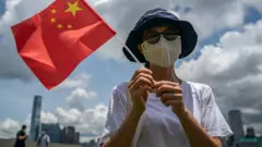 親北京人士認為《國安法》可以令香港穩定。