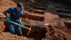 Gravedigger in Brazil
