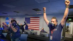 Nasa team members celebrating