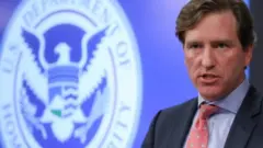 Chris Krebs speaks in 2018