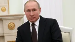 Путин