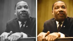 Dr. Martin Luther King leans forward over a podium