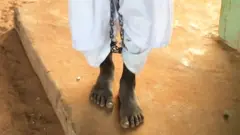 Garçon enchaîné