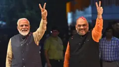 નરેન્દ્ર મોદી અને અમિત શાહ