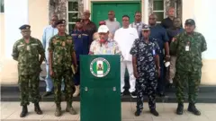 Govnor Willie Obiano with security personnel