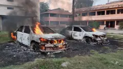 নোয়াখালীতে সহিংসতার সময় পুড়িয়ে দেয়া গাড়ি