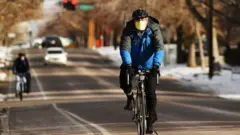Cyclist in Denver, Colorado on Thursday. December 17, 2020