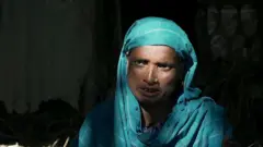 বাড়িঘর হারিয়ে ছোট ছোট সাত সন্তান নিয়ে অসহায় অবস্থার মধ্যে পড়েছেন খোদেজা বেগম।