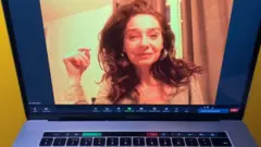 Yzabel on a computer screen