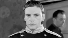 Black and white photo of Jean-Louis Trintignant
