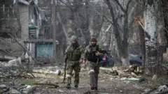 Chechens from the Russian armed forces patrol in Mariupol