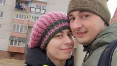 The couple posing on the International Women's Day,
