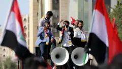 متظاهرون عراقيون رافضون لـ"قانون سانت ليغو"