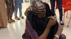 Di boy and girl dey hug each oda afta di proposal