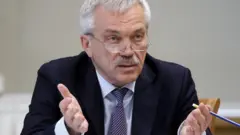Евгений Савченко