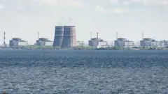 A general view shows the Zaporizhzhia nuclear power plant, situated in the Russian-controlled area of Enerhodar, seen from Nikopol in April 2022