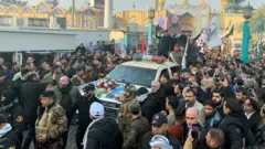 People gather at the funeral of the Iranian Major-General Qassem Soleimani, top commander of the elite Quds Force of the Revolutionary Guards, and the Iraqi militia commander Abu Mahdi al-Muhandis